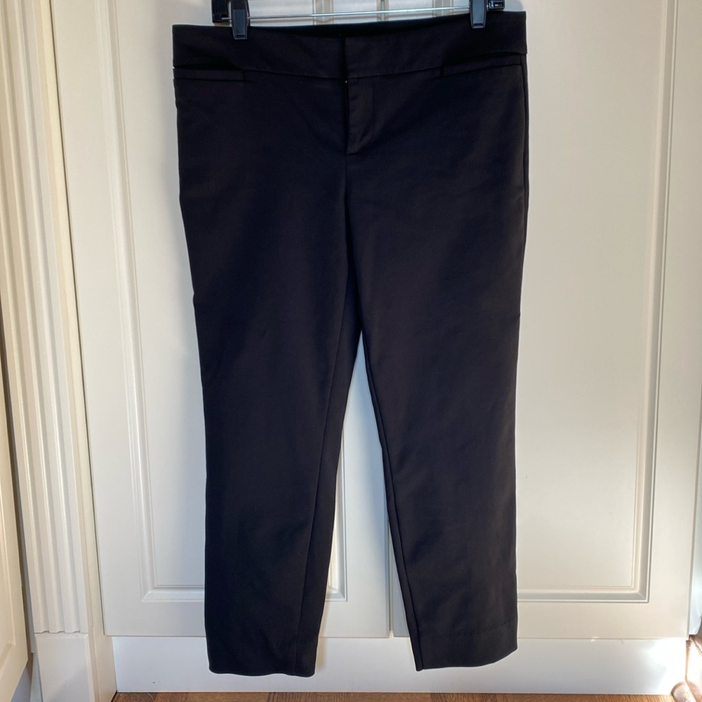 BEBE BLACK PANTS SIZE 10 .